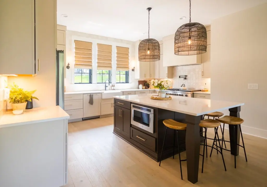 Professionally painted kitchen cabinets with a smooth, durable finish after proper sanding