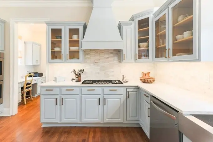 kitchen cabinets professional painting service in a light blue color