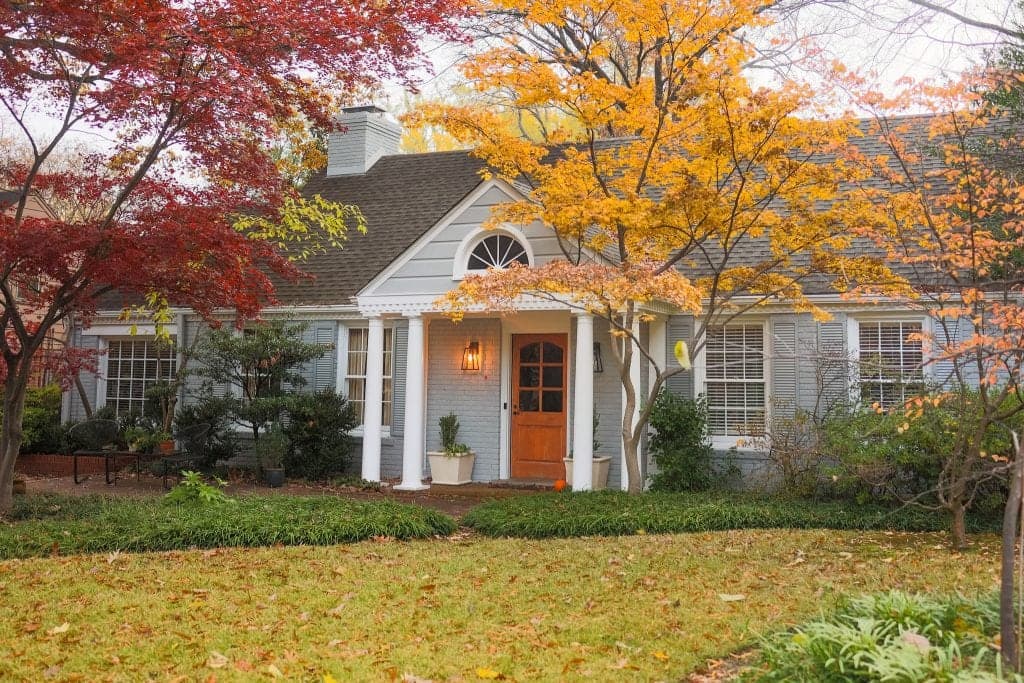 Blue gray painted house exterior with fresh trim and strong curb appeal