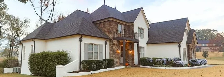 Exterior painting service with Romabio masonry flat in Crestolo white