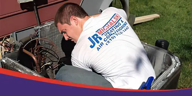 JR Michalski technician repairing an air conditioning unit in Bucks County PA