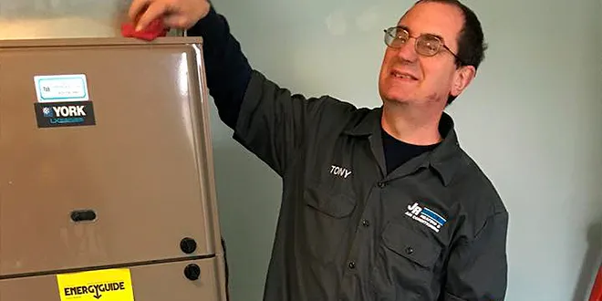 JR Michalski technician installing a new high-efficiency heating system in Langhorne PA