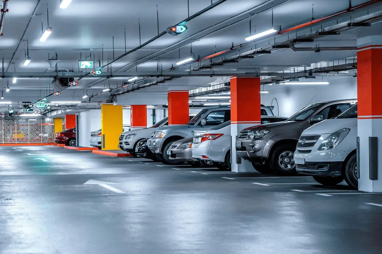 Headlamp lights with elegant and luxury design. Automotive industry and hybrid car concept. Underground parking.