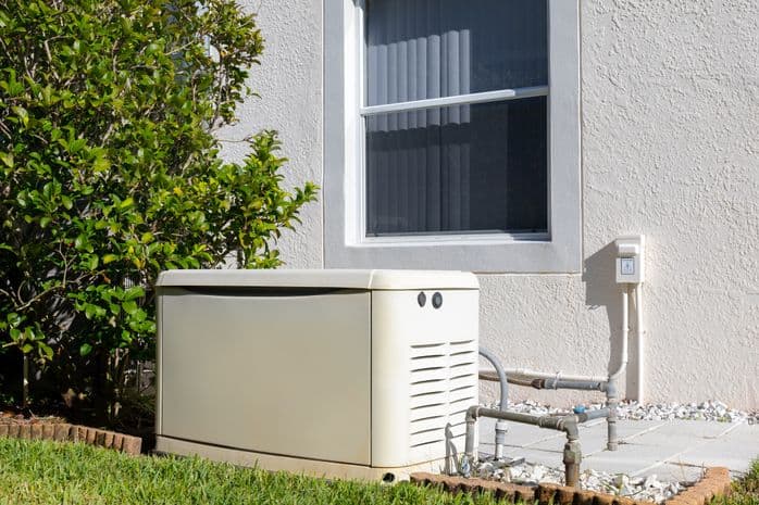 Home electric power generator on the side of house for use of emergency power outage