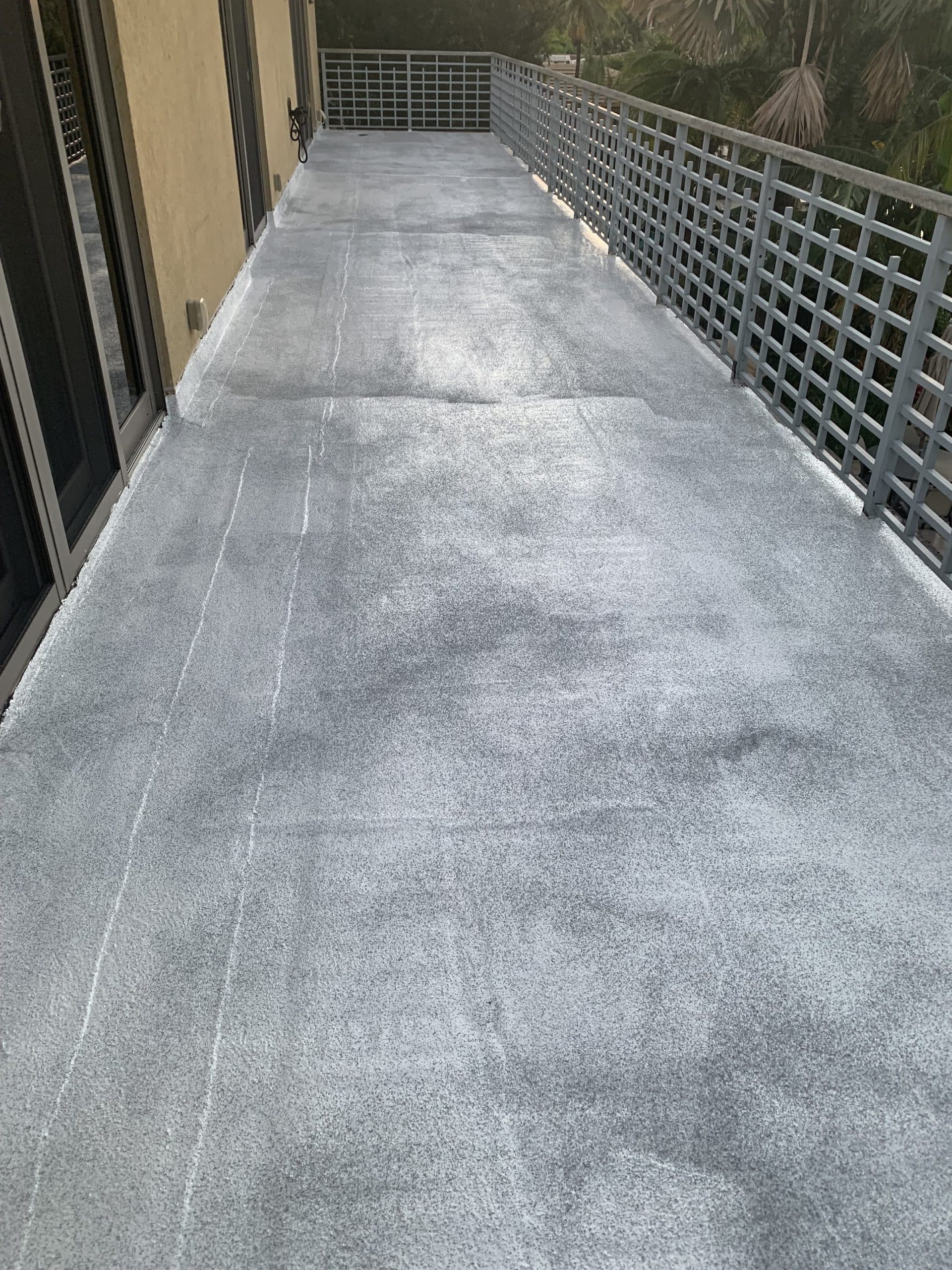 Coated concrete walkway after waterproofing