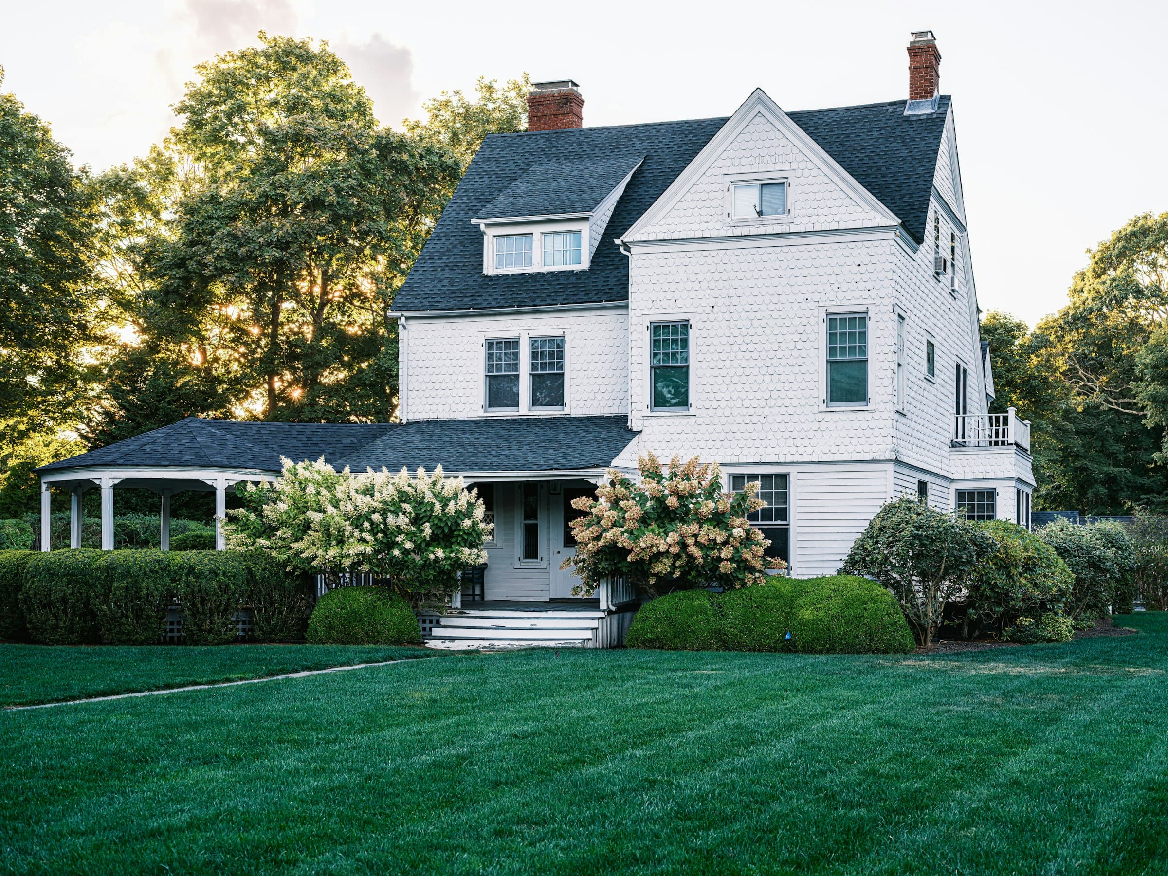 Coastal-style home with painted siding