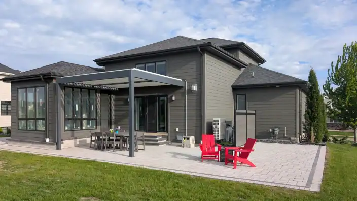 Trusted Landscaping Company Serving Madison, WI 8 Contemporary Madison home featuring a stylish outdoor patio and well-maintained landscaping.