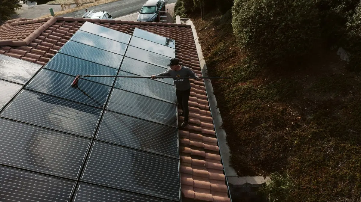 YES team member working on solar panels