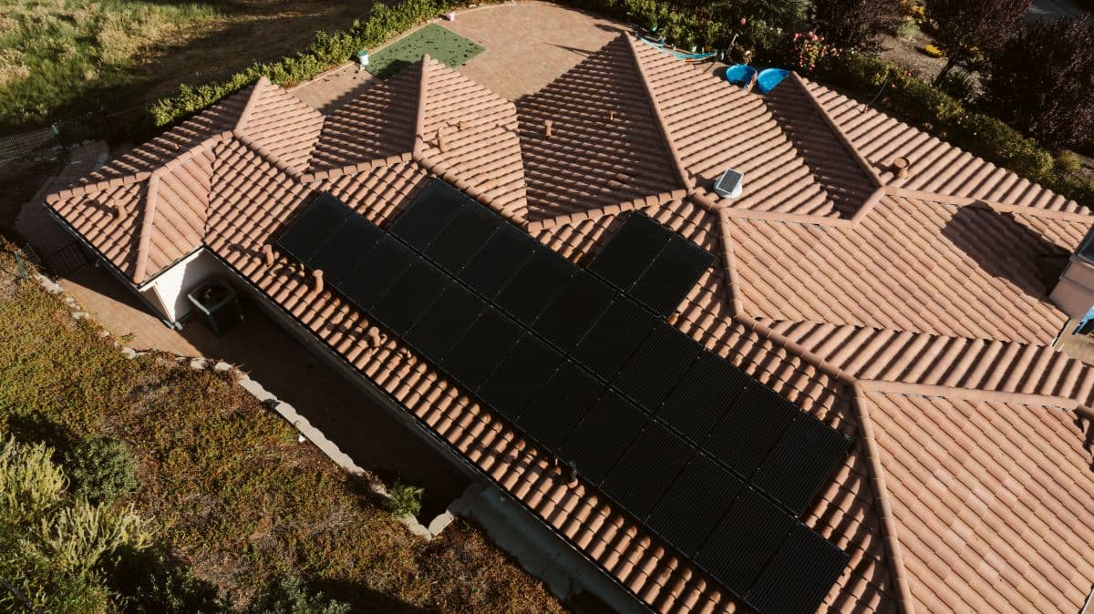Drone view of a roof with solar panels