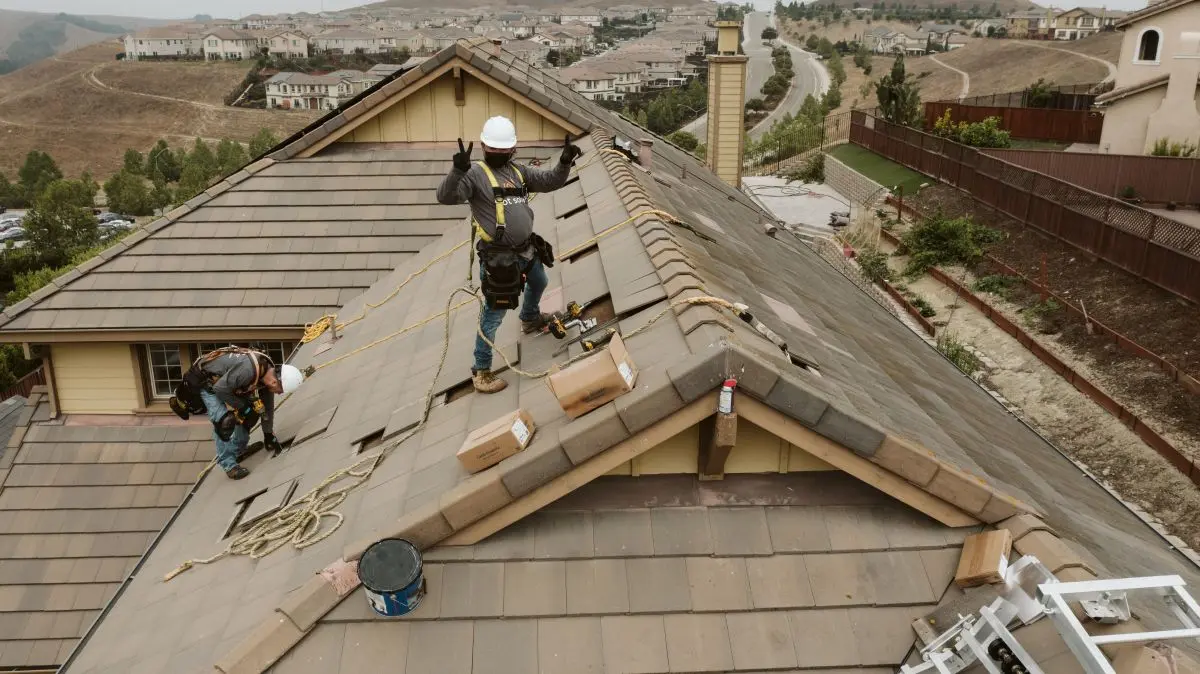 YES team working on a roof