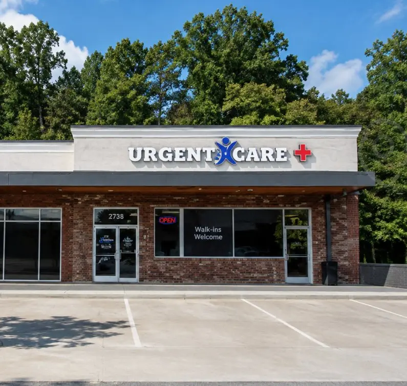 Storefront of Atlanta Urgent Care at Druid Hills, 2738 Clairmont Road NE, with a Walk-ins Welcome sign